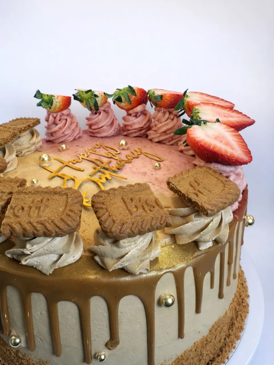 Half Biscoff cake, half strawberry cake, from the sponge to the filling to the finish