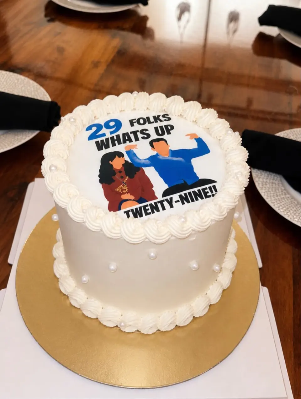 Chocolate birthday cake with white buttercream and a printed topper