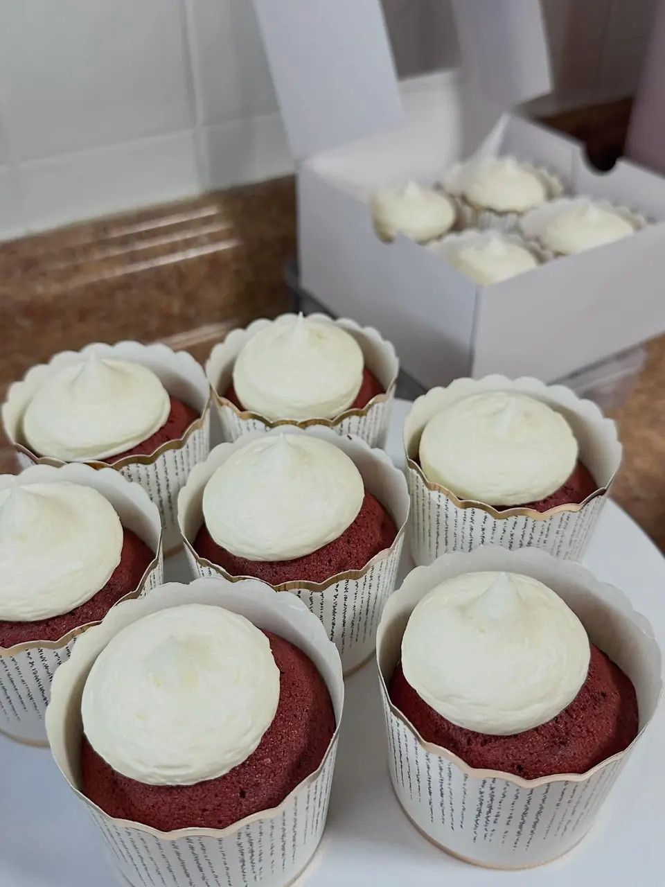 Signature Red Velvet cupcakes with cream cheese frosting